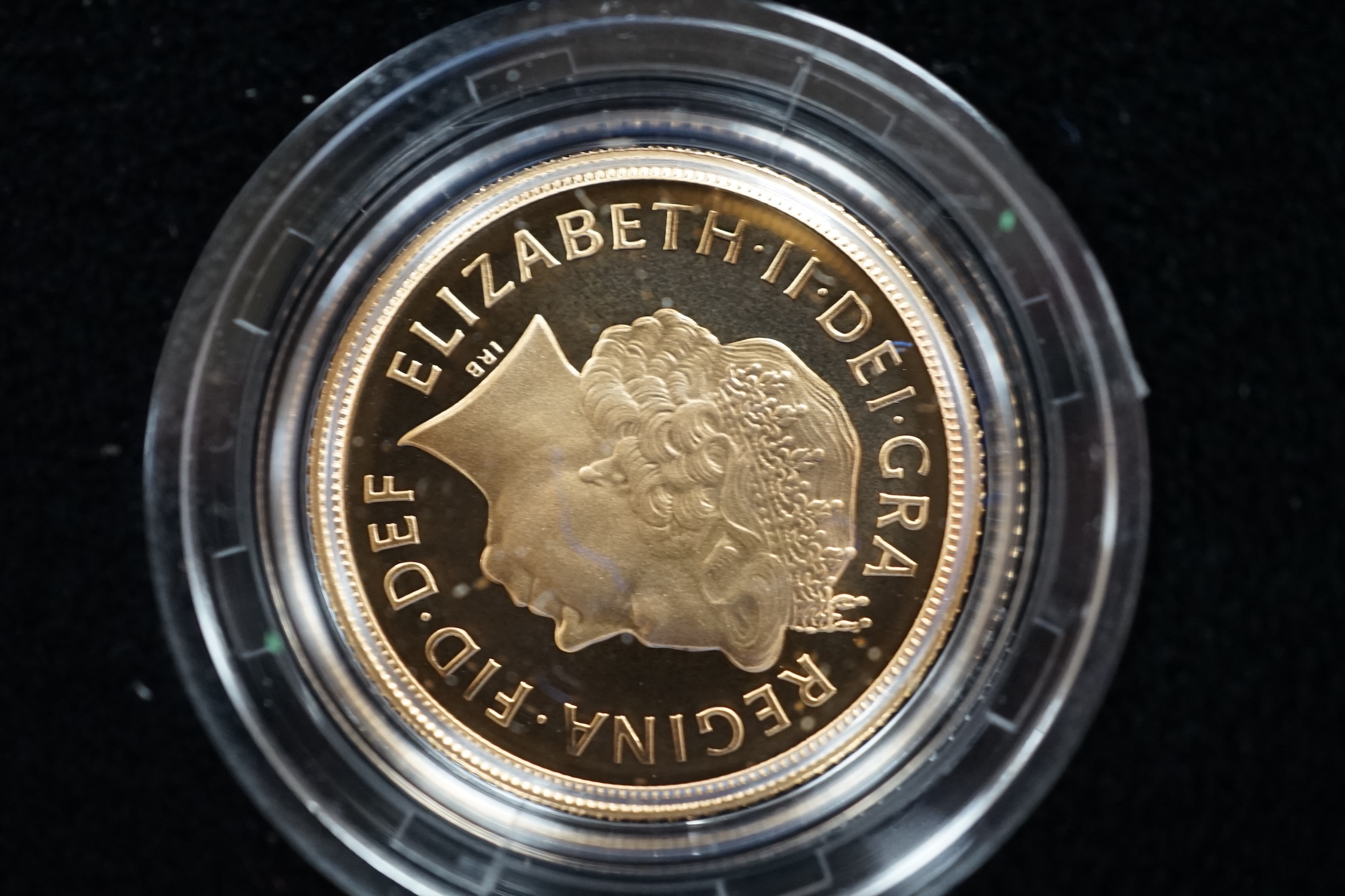 A cased 2002 United Kingdom gold proof sovereign three coin collection, with certificate.